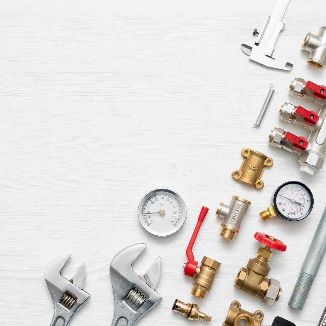 Plumbing equipment layed out on table