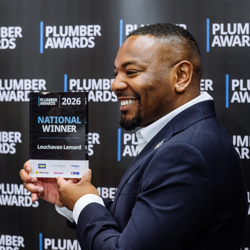Louchavan Lemard of PH247 holding his National Winner trophy at The Plumber Awards 2026