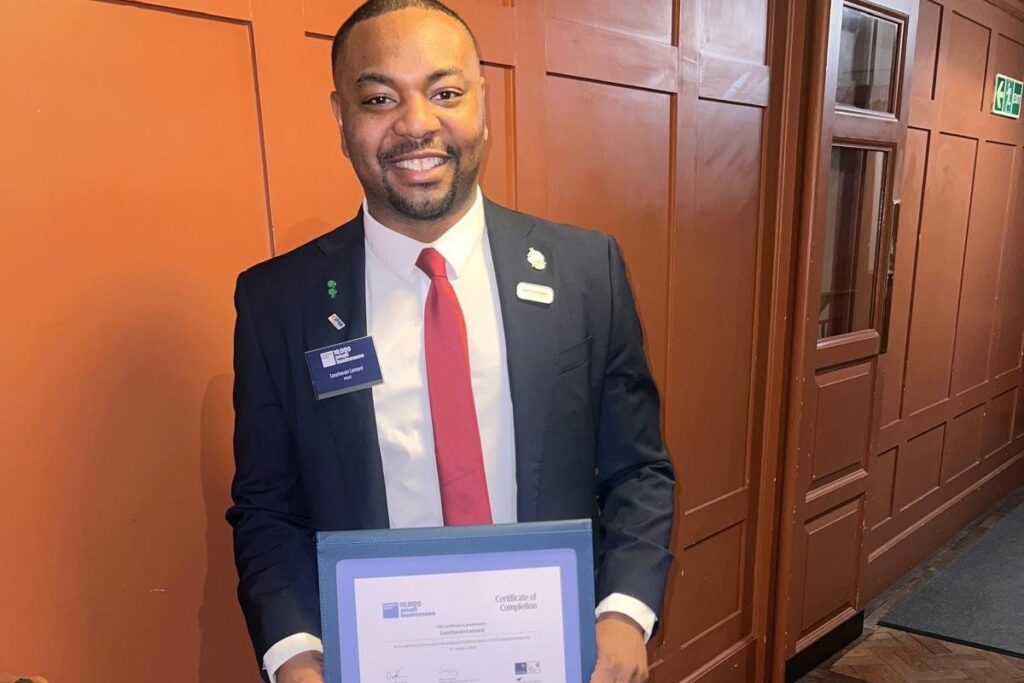 Louchavan Lemard, Goldman Sachs 10,000 Small Businesses UK graduate Louchavan Lemard holding his Goldman Sachs 10,000 Small Businesses UK certificate of completion