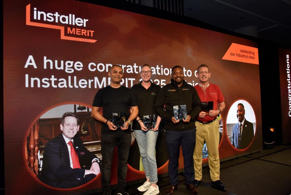 InstallerMERIT 2025 recipients at InstallerSHOW Louchavan Lemard of PH247 on stage with the other InstallerMERIT 2025 recipients at InstallerSHOW